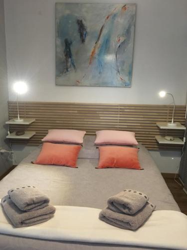 Ένα ή περισσότερα κρεβάτια σε δωμάτιο στο Appartement Colmar Petite Venise