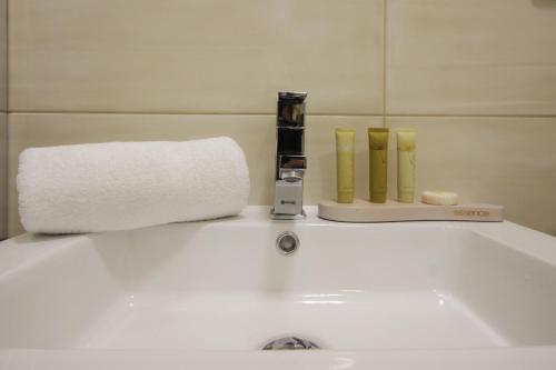 Koupelna v ubytování Alveo Suites