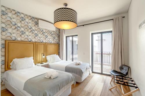 BAIRRO ALTO MODERN WITH TERRACE AND GARAGE by Homi
