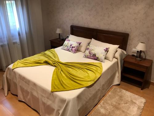 Ένα ή περισσότερα κρεβάτια σε δωμάτιο στο A Casa de Lelo