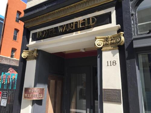 a building with a sign that reads lost wanted at Warfield Hotel in San Francisco