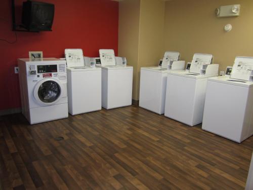 a group of washing machines in a laundry room at Extended Stay America Suites - Los Angeles - Monrovia in Monrovia