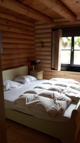 Ένα ή περισσότερα κρεβάτια σε δωμάτιο στο Chalet 294 - Krabbenkreek