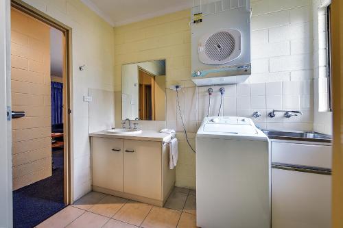 Ванная комната в Allambi Holiday Apartments