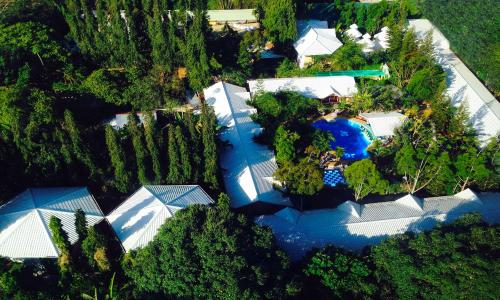 an overhead view of a resort with a swimming pool at Deep Forest Garden Hotel in Puerto Princesa City