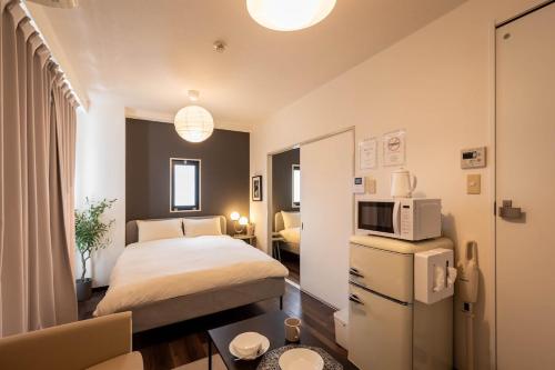 Stay 1St 503 8 min walk to Namba 13 min to Dotonbori 4 min walk to Sakuragawa Station
