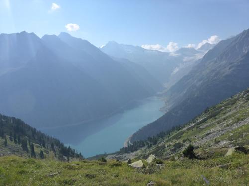 a view of a valley in the mountains at Landhaus zum Griena in Mayrhofen