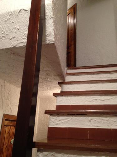 a stairway with a mirror on the wall at il Magàn - Cinque Terre in Corniglia