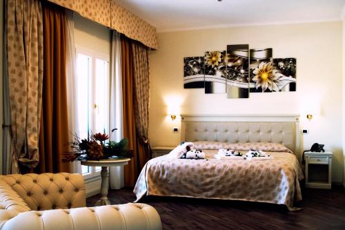 Postel nebo postele na pokoji v ubytování Hotel Colaiaco