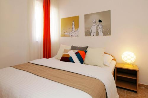 Postel nebo postele na pokoji v ubytování Apartments Villa Adria Bol