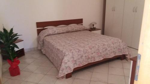 Letto o letti in una camera di Casa Timpanella