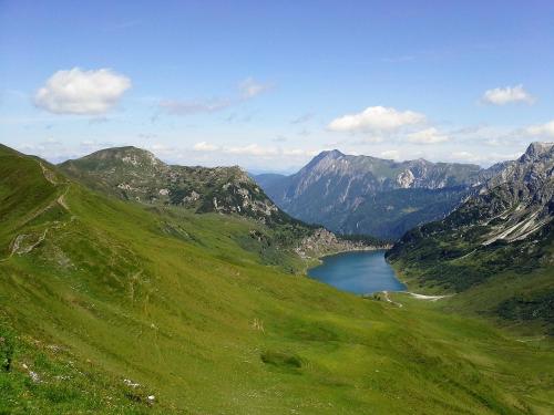 a view of a mountain valley with a lake at Saghäusl in Mitterkleinarl
