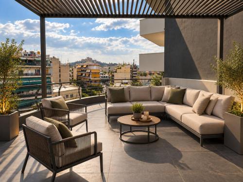 Orange Building Athens By Phos Living