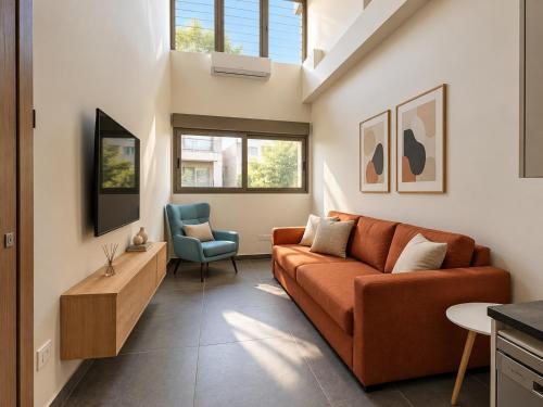 Orange Building Athens By Phos Living