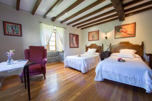Ліжко або ліжка в номері Pazo da Trave