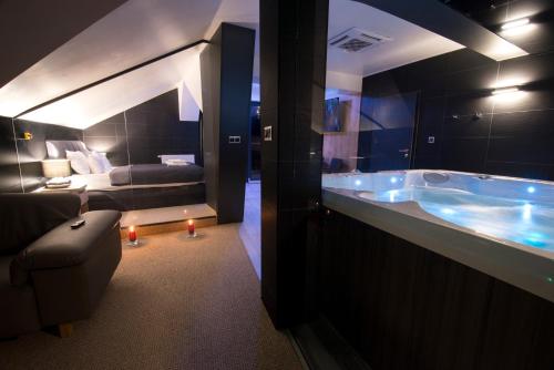 Кровать или кровати в номере Hotel Jakuszyce Sport & Spa