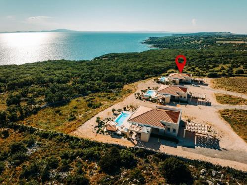 Villa 5 Luxury Seaview Villa Plant 6 with pool by Interhome