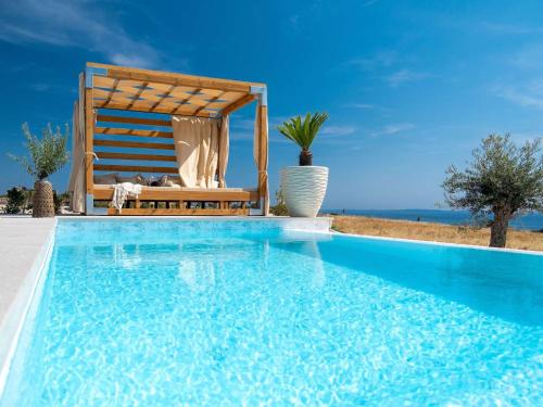 Villa 5 Luxury Seaview Villa Plant 5 with pool by Interhome