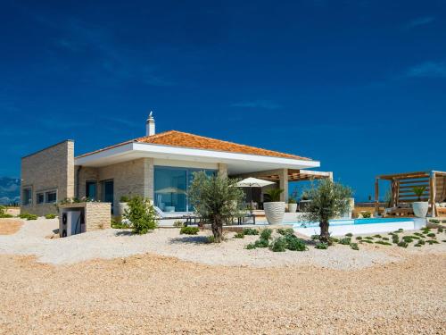 Villa 5 Luxury Seaview Villa Plant 1 with pool by Interhome