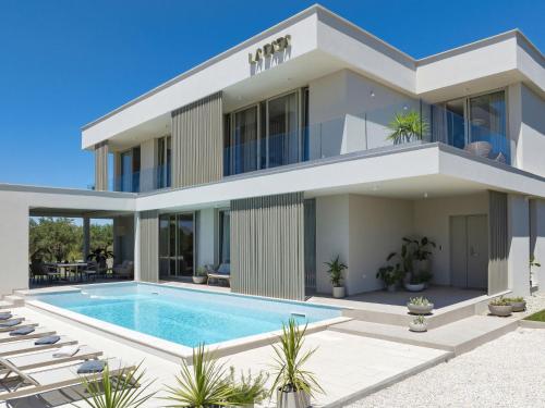 Villa 5 Luxury villa La Casa with heated pool and sauna by Interhome