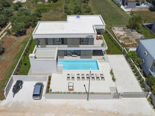 Villa 5 Luxury villa La Casa with heated pool and sauna by Interhome