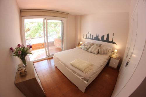 A bed or beds in a room at Musclera