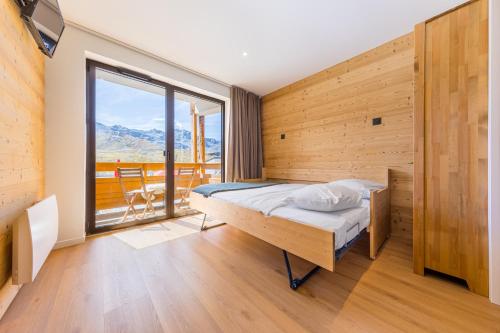 Residence Les Olympiades, Ski In-Out with WiFi in Val Thorens, "V19, V20, V21" by Versant Collection