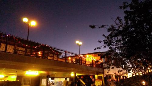 a building at night with lights on top of it at Bokelai B&B in Renai