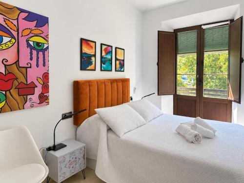 Casa Anjelita es un espacioso alojamiento en el Bajo Albaicin, 3 dormitorios, todo climatizado, ideal para ocio o trabajo a un paso del centro historico y de la sede de la universidad