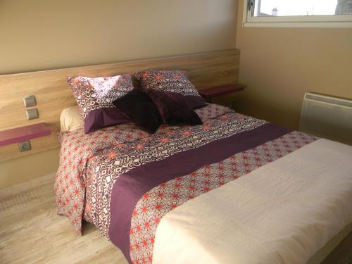 Postel nebo postele na pokoji v ubytování Maison Landreau
