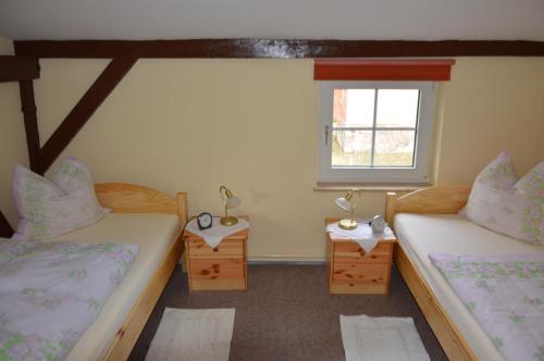 Ένα ή περισσότερα κρεβάτια σε δωμάτιο στο Ferienwohnung Siebmann