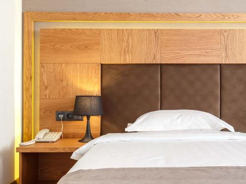 Una cama o camas en una habitación de VisPas Balti