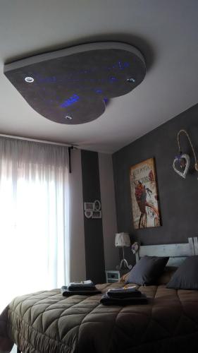 Ένα ή περισσότερα κρεβάτια σε δωμάτιο στο Caicai Bed And Breakfast