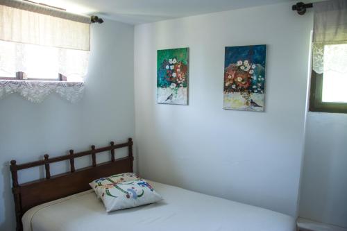 Ένα ή περισσότερα κρεβάτια σε δωμάτιο στο Guest House Vila Albedo