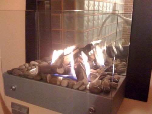 a bunch of donuts are cooking in an oven at Alojamiento la Luz de la Sierra in Prádena