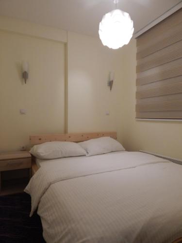 Giường trong phòng chung tại Apartments Zed Vila Zvoncica