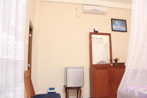 TV a/nebo společenská místnost v ubytování Mermaid Inn