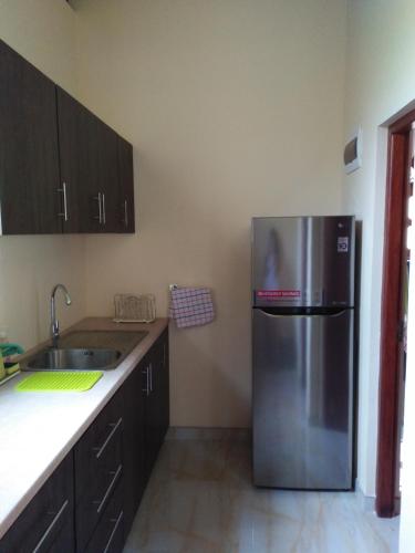Una cocina o cocineta en White Elephant Villa & Restaurant