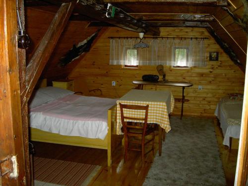 Postel nebo postele na pokoji v ubytování Chata Fojtka