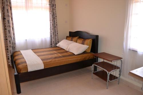 Cama o camas de una habitación en Azanza Mtwapa Holiday Home