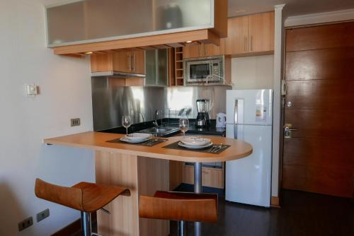 Dapur atau dapur kecil di Apartamentos Cordova Savini