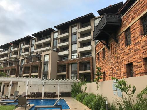 Πισίνα στο ή κοντά στο Zimbali Suite 107