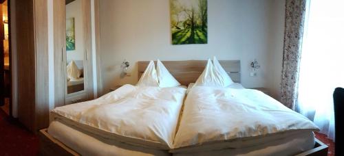Cama o camas de una habitación en Landgasthof Hotel Zehenthof