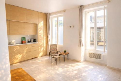 L’Écrin du Chemin Vert – Studio parisien