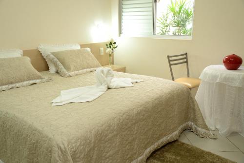 Postel nebo postele na pokoji v ubytování Hotel Calypso