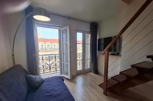 Duplex with balcony by the République tram stop