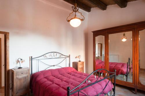 Postel nebo postele na pokoji v ubytování Il Convento sul Gizio