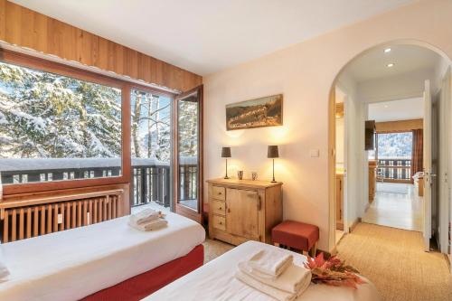 Apt Du Plan Praz-Brévent 4-min to lift, parking & balcony - Happy Rentals