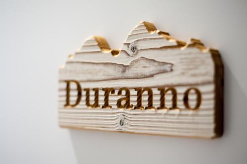 a book with the word durango written on it at Dimora Al Bivacco in Pieve di Cadore