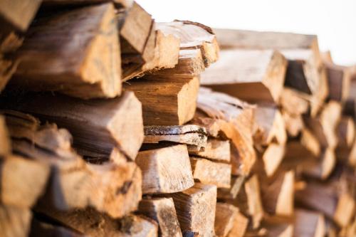 a pile of fire wood stacked on top of each other at Dimora Al Bivacco in Pieve di Cadore